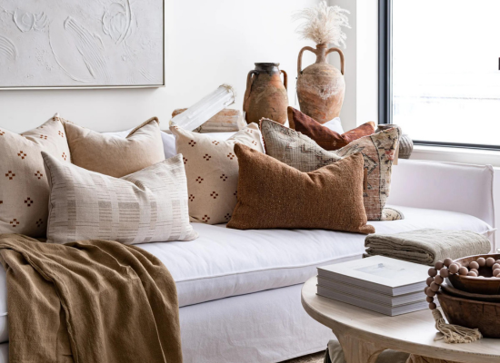 Image. White couch combined with brown decor.